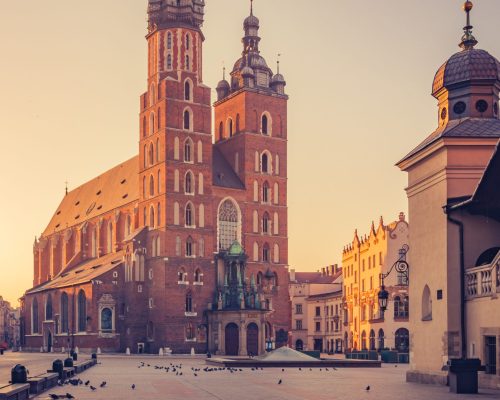 Krakow, Poland, St Mary's church on the Main Square in the morning sunlight